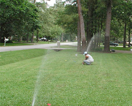 Jake, one of our Houston irrigation contractors is aligning a sprinkler head